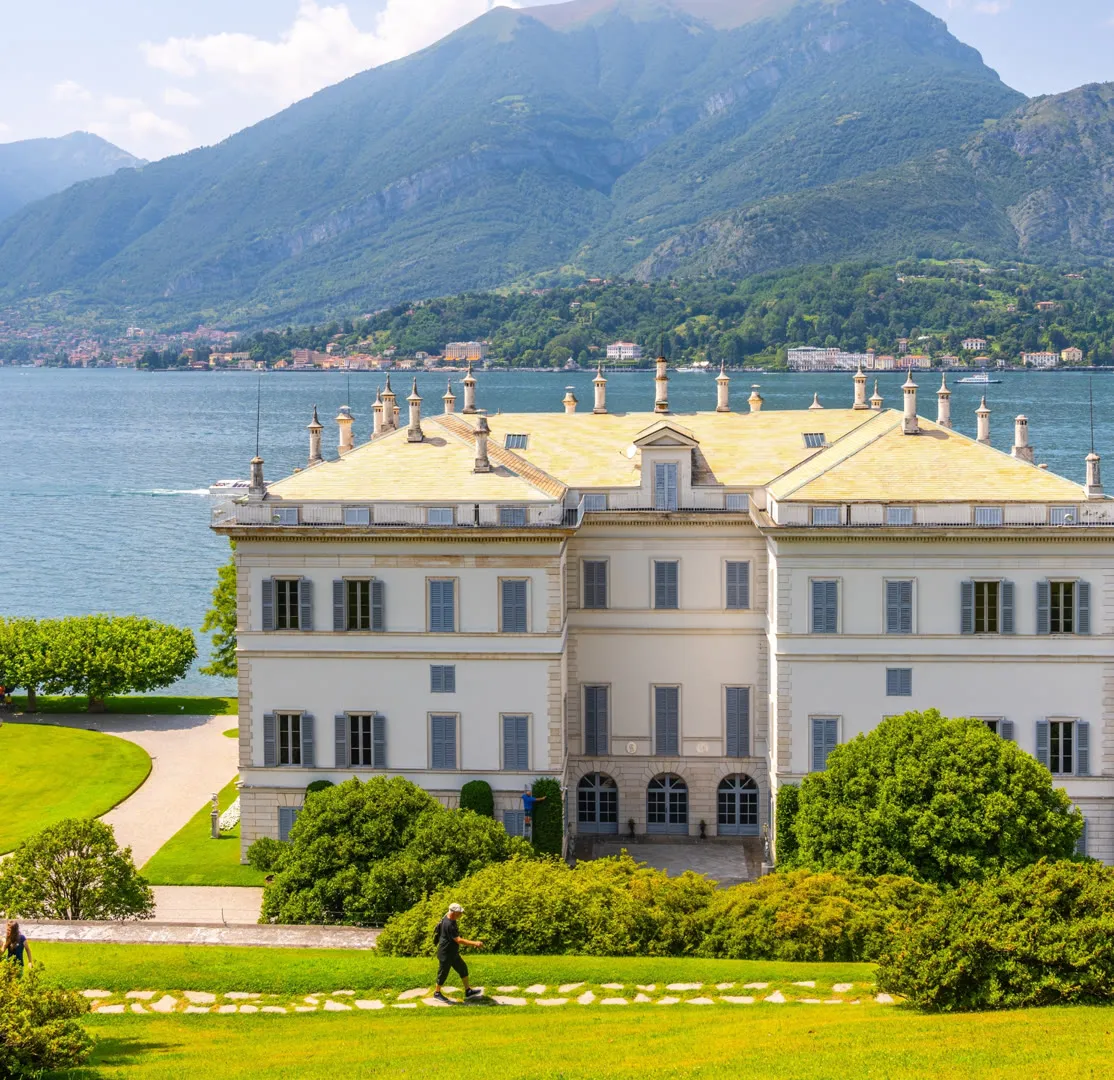 Grand lakeside villa with formal gardens