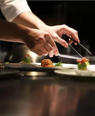 Chef plating a dish
